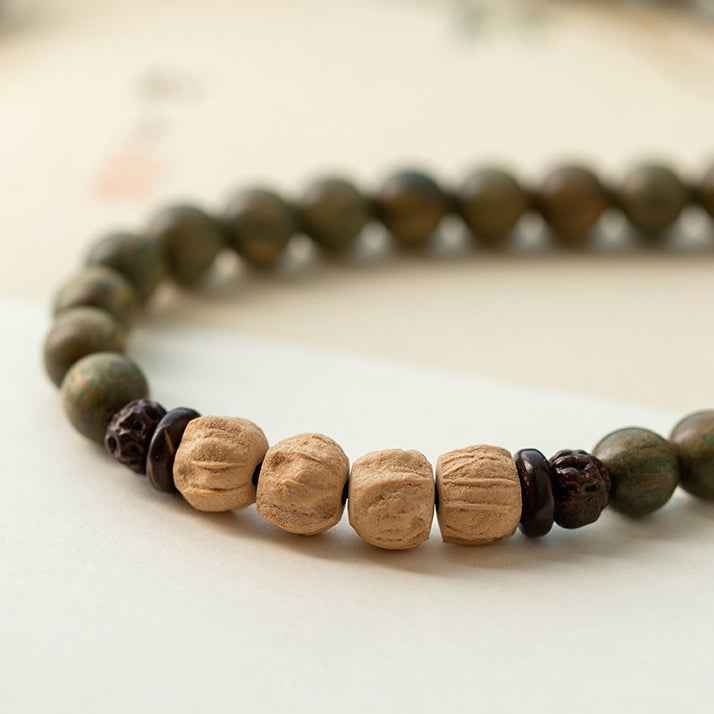 Green Sandalwood Buddhist Beads Bracelet Passion Fruit Seed Bracelet Couple Ethnic Style - Lunaria